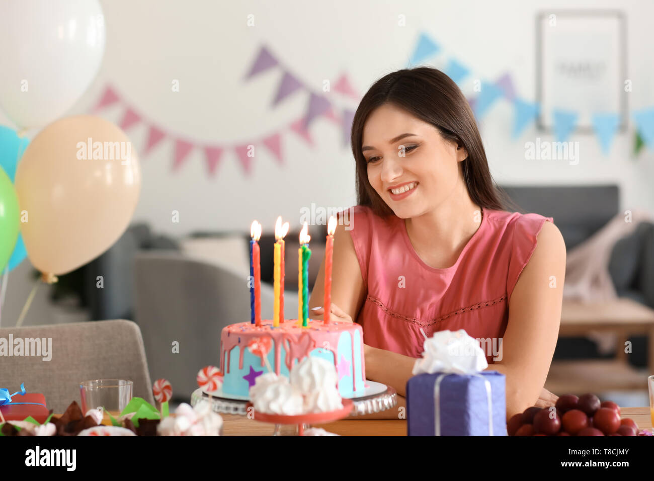 Young woman eat birthday cake hires stock photography and images Alamy — free download