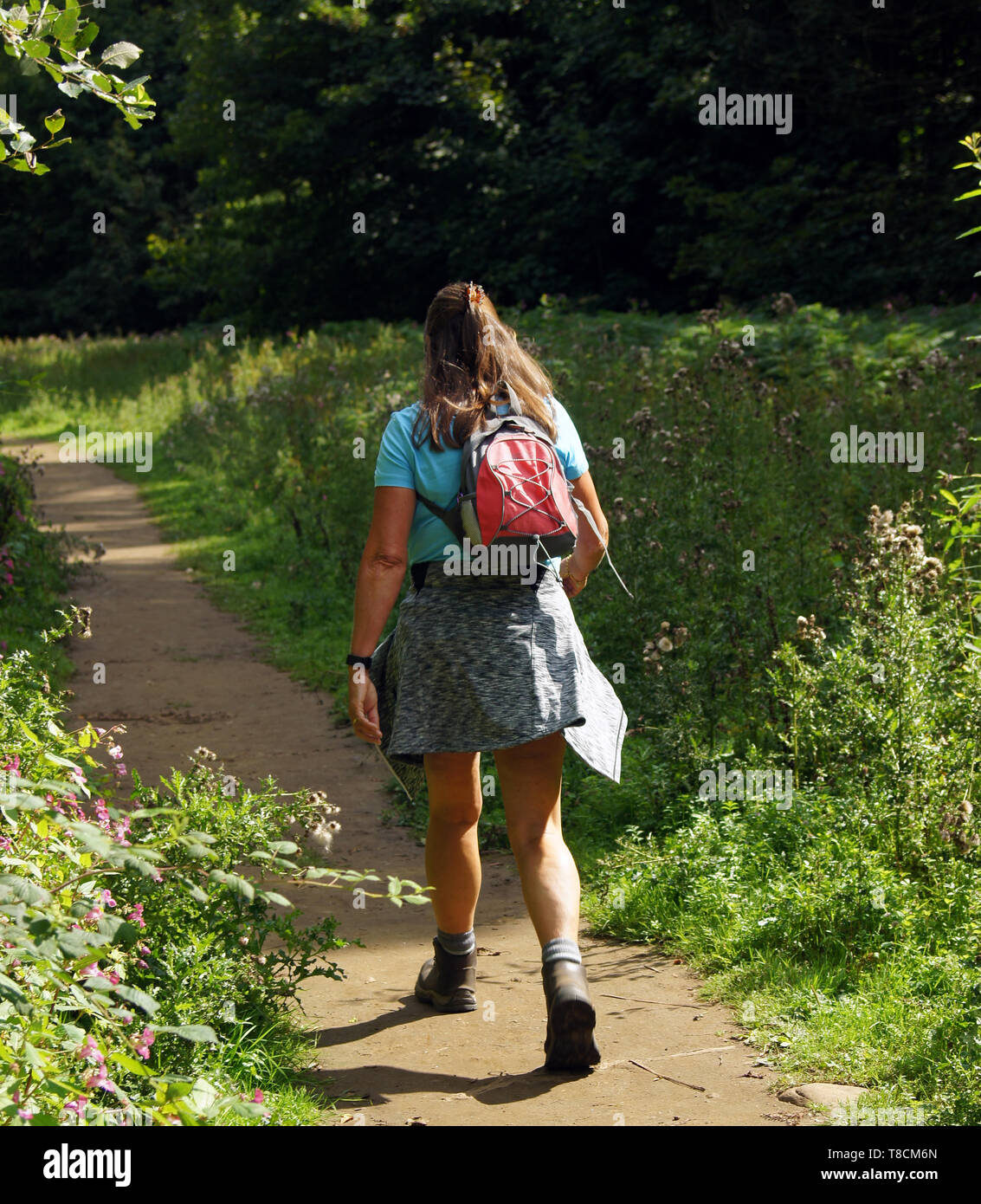 Walk With Rucksack Woman wearing walking rucksack hi-res stock photography and images - Alamy