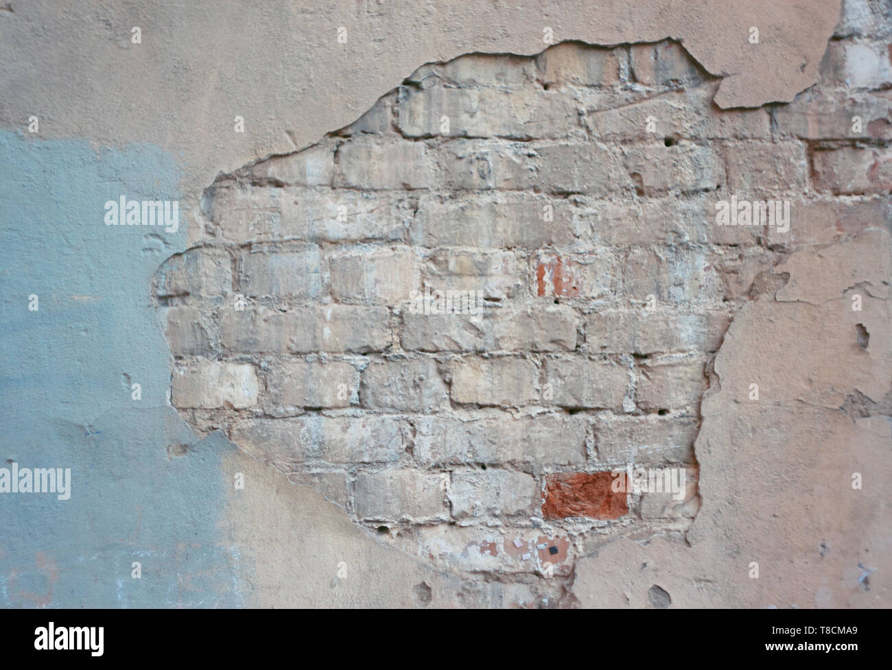 Abandoned Old Brick Wall Of The Building With Painted And