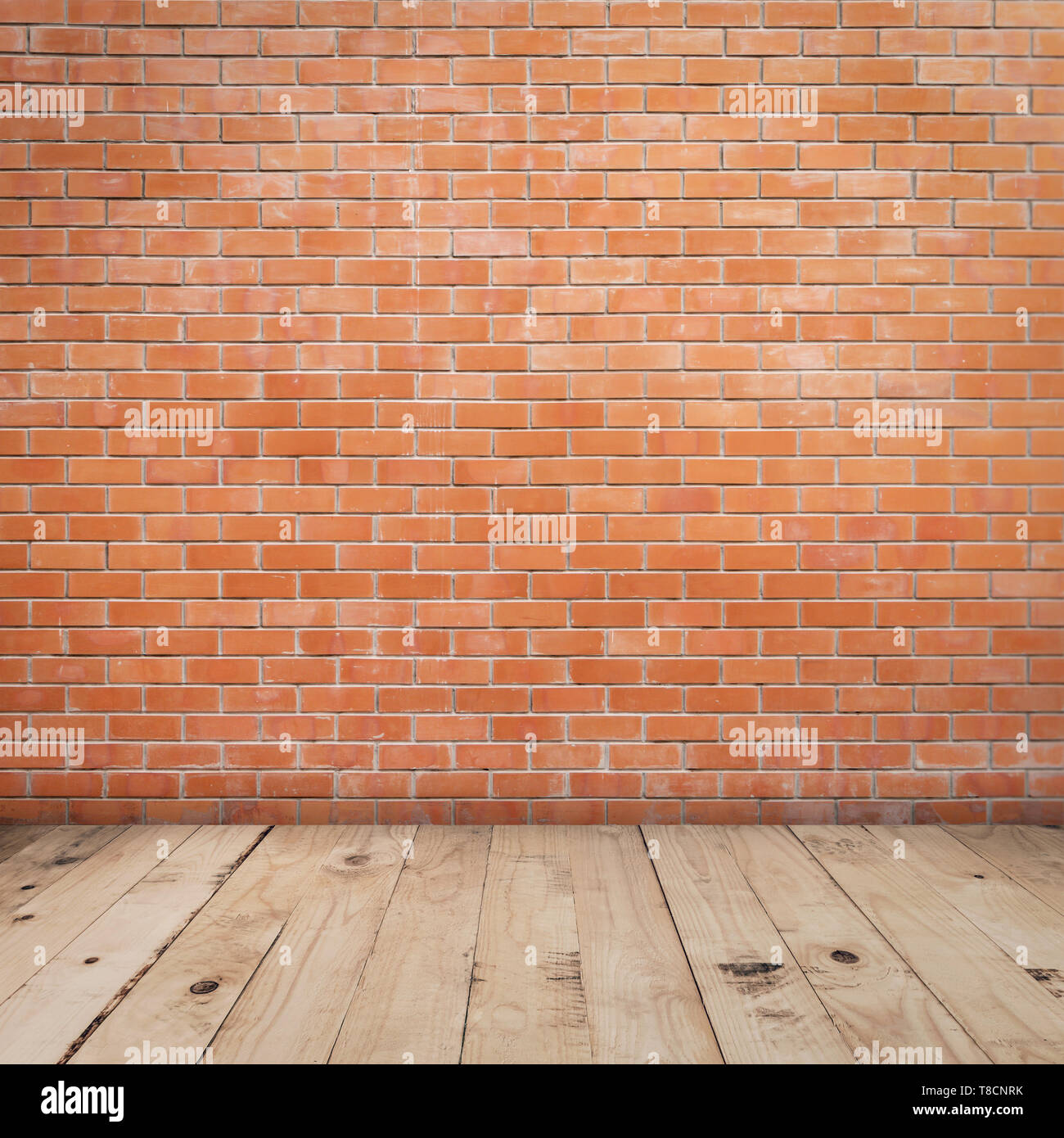 Old red brick wall and wood floor background and texture with copy