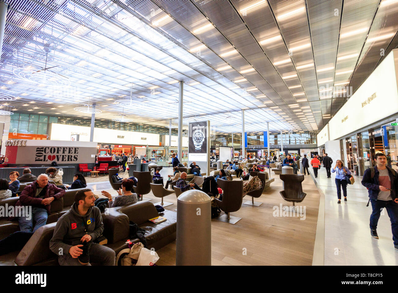 Charles De Gaulle Airport, interior. Main central departure lounge area of Terminal 2E with Charles De Gaulle Airport, interior. Main central departure lounge area of Terminal 2E with