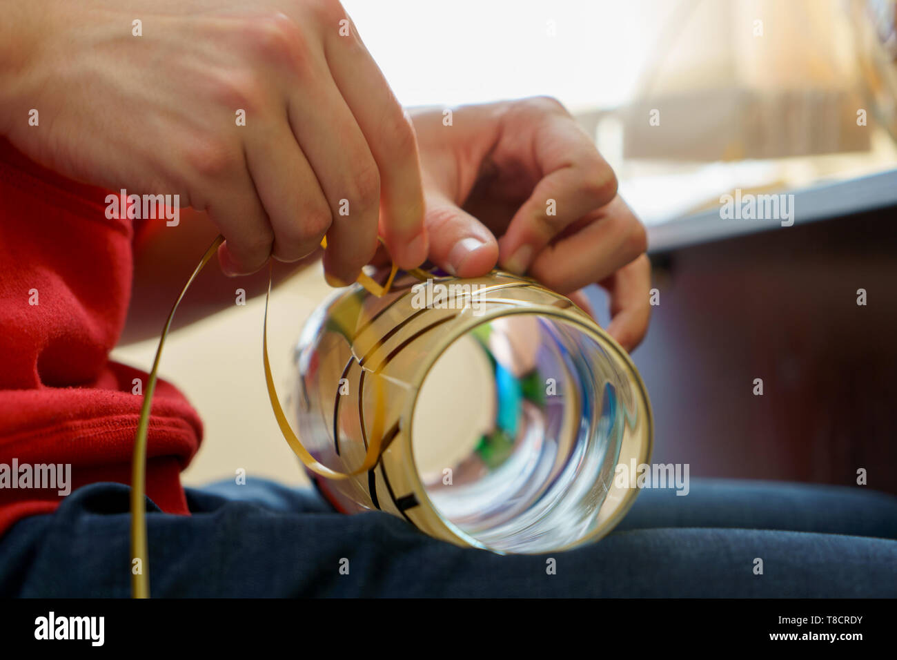 Men S Hands Make A Stained Glass Window On Glass Vase Or Lamp