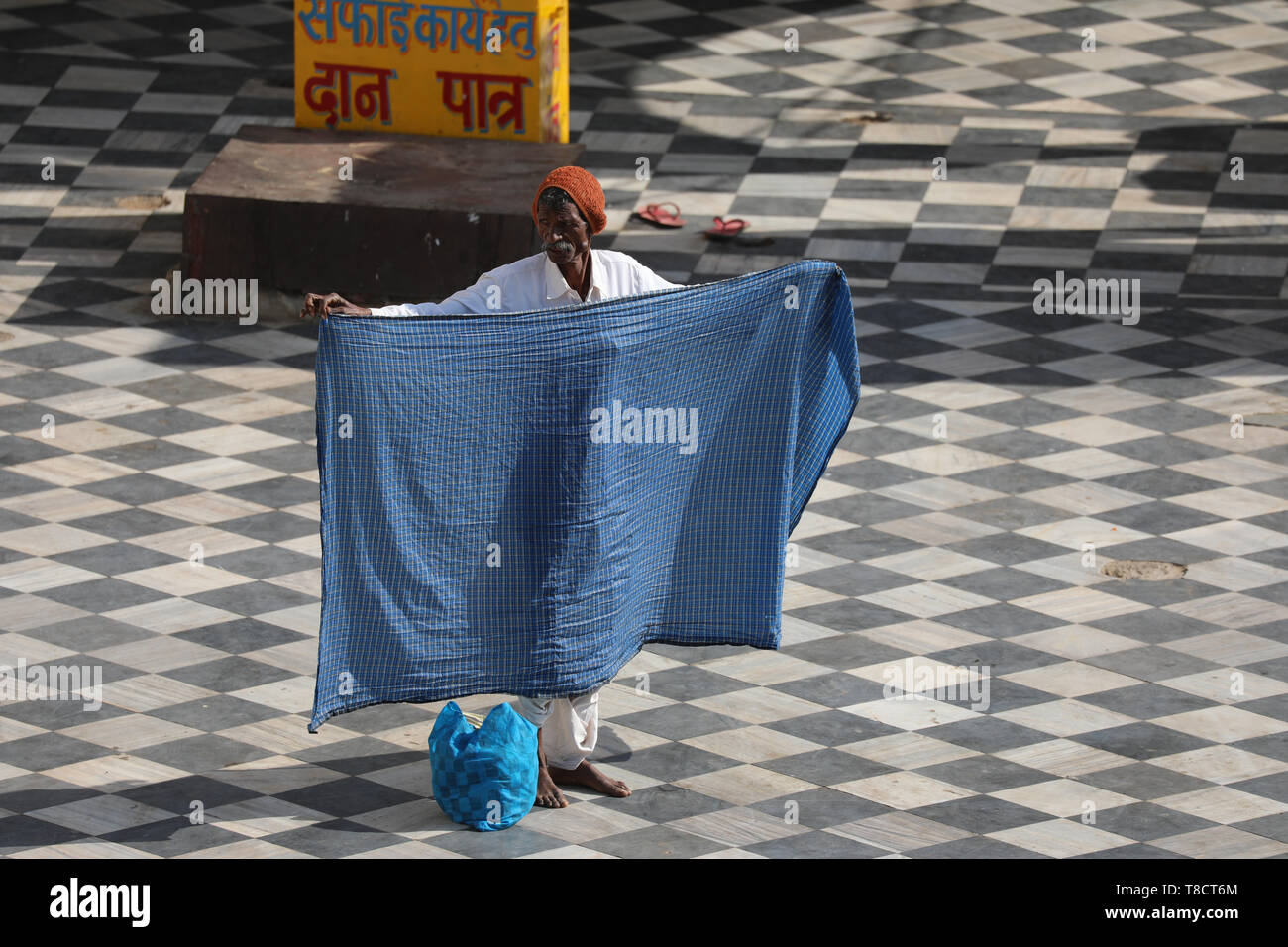 Man has washing his sari Stock Photo