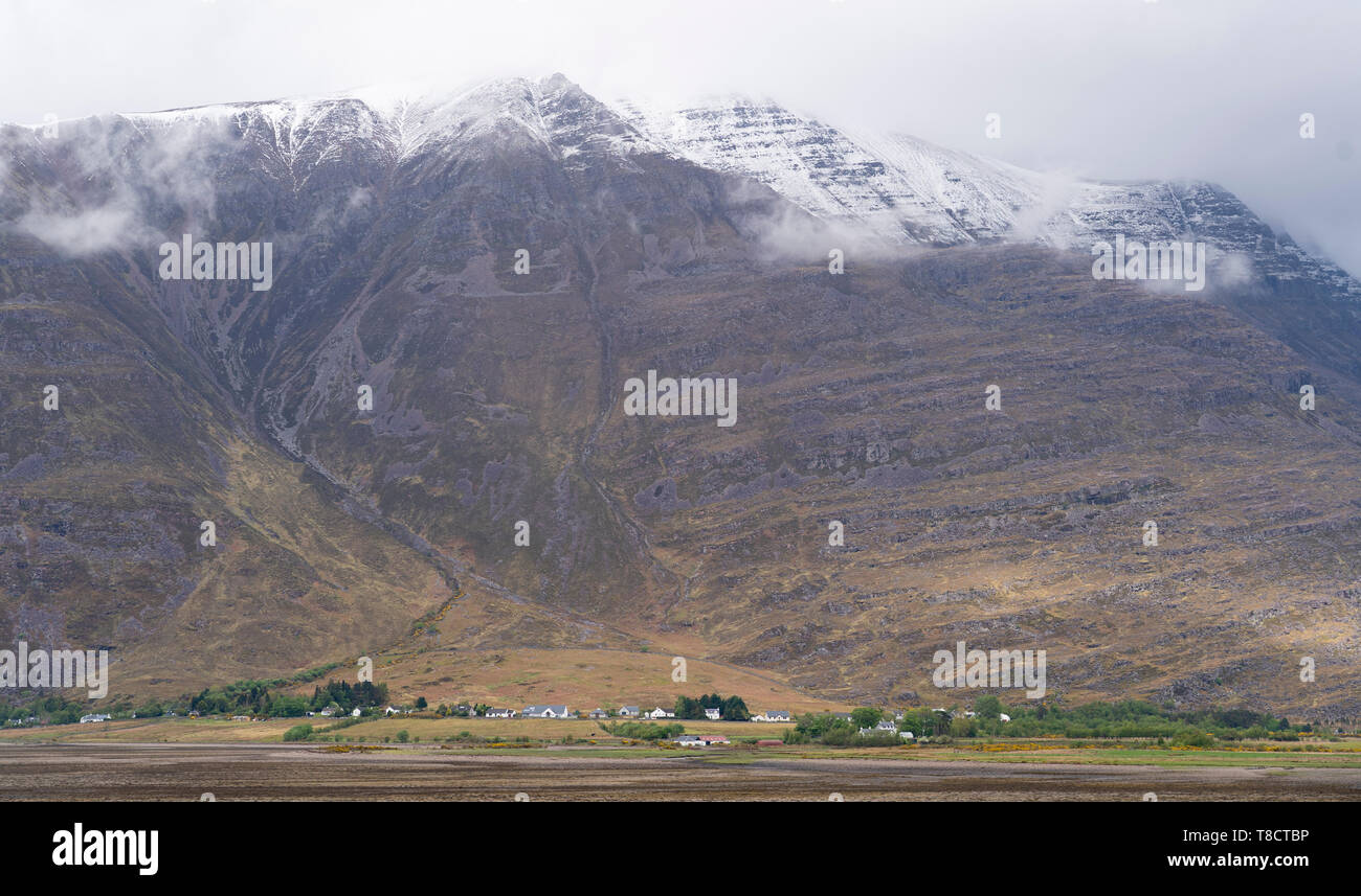 Village of  Torridon and Liathach mountain on  the North Coast 500 scenic driving route in northern Scotland, UK Stock Photo