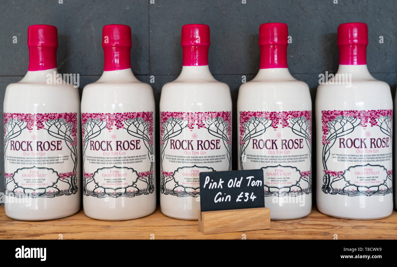 Bottles of Rock Rose Gin at Dunnet Bay Distillery in Caithness on  the North Coast 500 scenic driving route in northern Scotland, UK Stock Photo