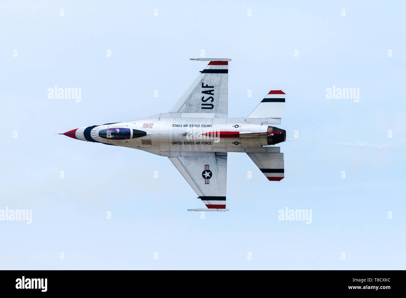 US Air Force Thunderbird rockets past while performing for a crowd at JBA air base outside of Washington, DC. Stock Photo