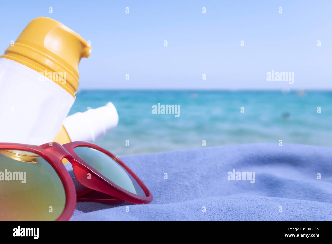 sun creams for summer. sun protection against sunburn. hydration and personal care on the beach. cream bottles for the skin. go to the beach Stock Photo