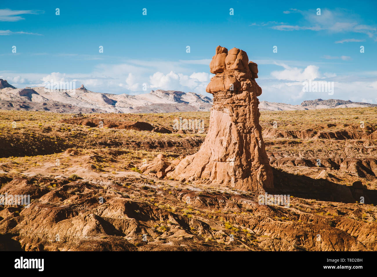 Panoramic view of beautiful desert landscape with hoodoos sandstone formations in Goblin Valley State Park in summer, Utah, USA Stock Photo