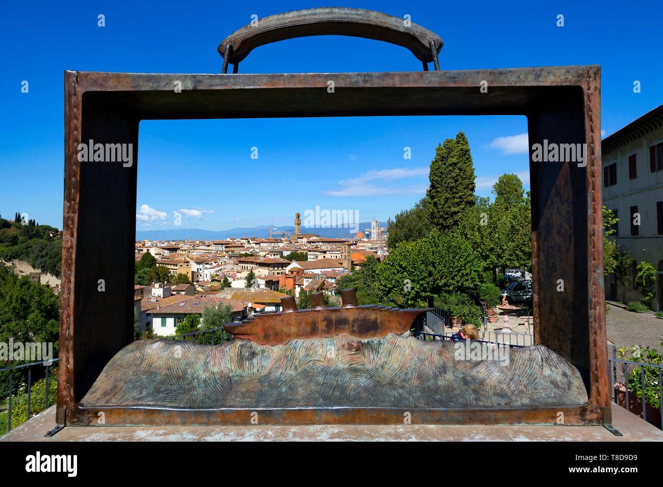 Italy, Tuscany, Florence, historic centre listed as World Heritage by UNESCO, San Miniato al Monte, San Miniato al Monte, Giardino delle Rose (Garden of Roses), sculpture entitled Leaving by Jean Michel Folon Stock Photo