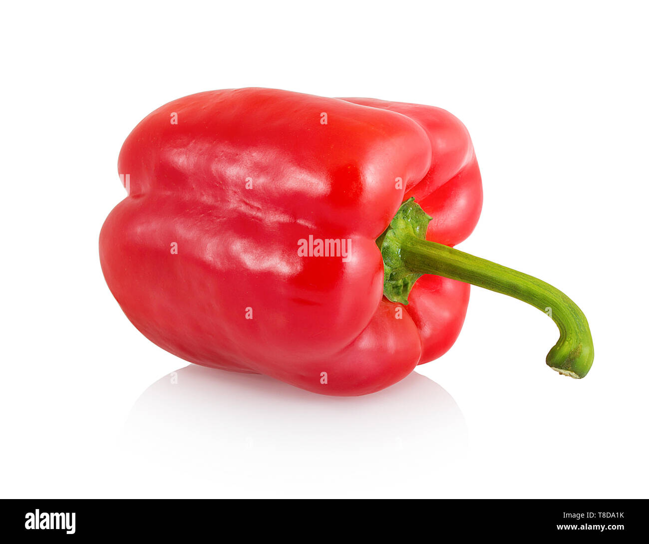Sweet red bell pepper with green stem isolated on white background with shadow reflection. Red sweet pepper isolated with clipping path. Stock Photo