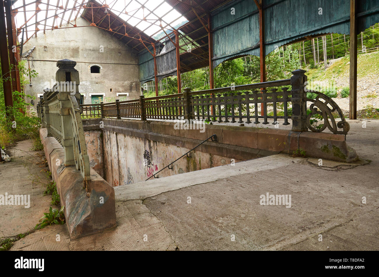 Stairs of underground passage in station platform at the abandoned Canfranc International railway station (Canfranc, Pyrenees, Huesca, Aragon, Spain) Stock Photo