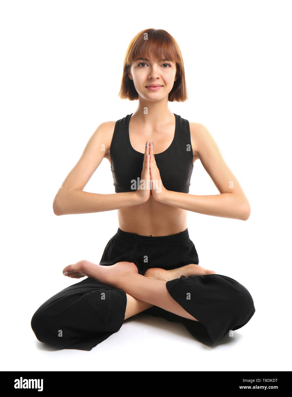 Sporty woman practicing yoga on white background Stock Photo - Alamy