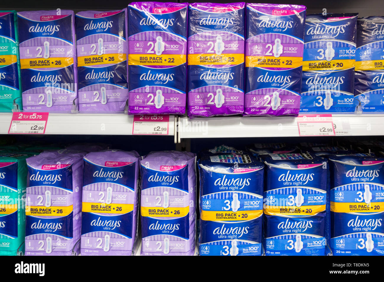 Rows of Always Sanitary Napkins on display on a supermarket shelf Stock Photo