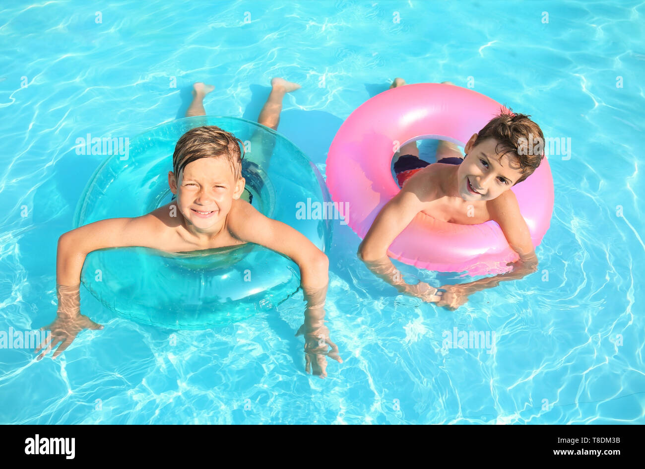 cute boys swimming