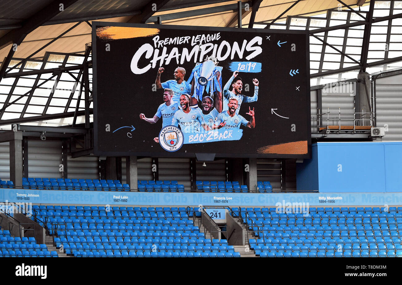 Stadium screen shows Manchester City as champions at the Etihad Stadium, Manchester Stock Photo