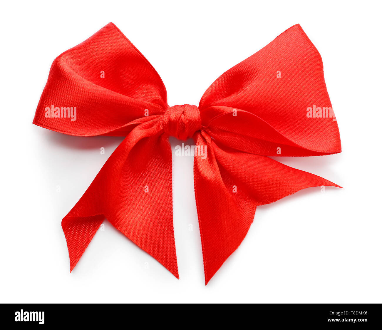 Beautiful bow from red ribbon on white background Stock Photo - Alamy