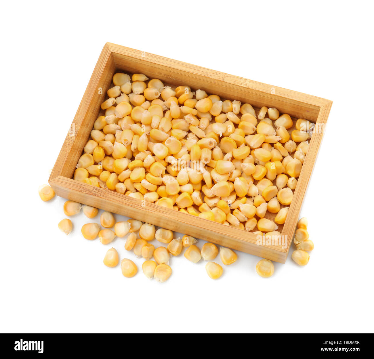 Wooden crate with ripe corn kernels on white background Stock Photo - Alamy