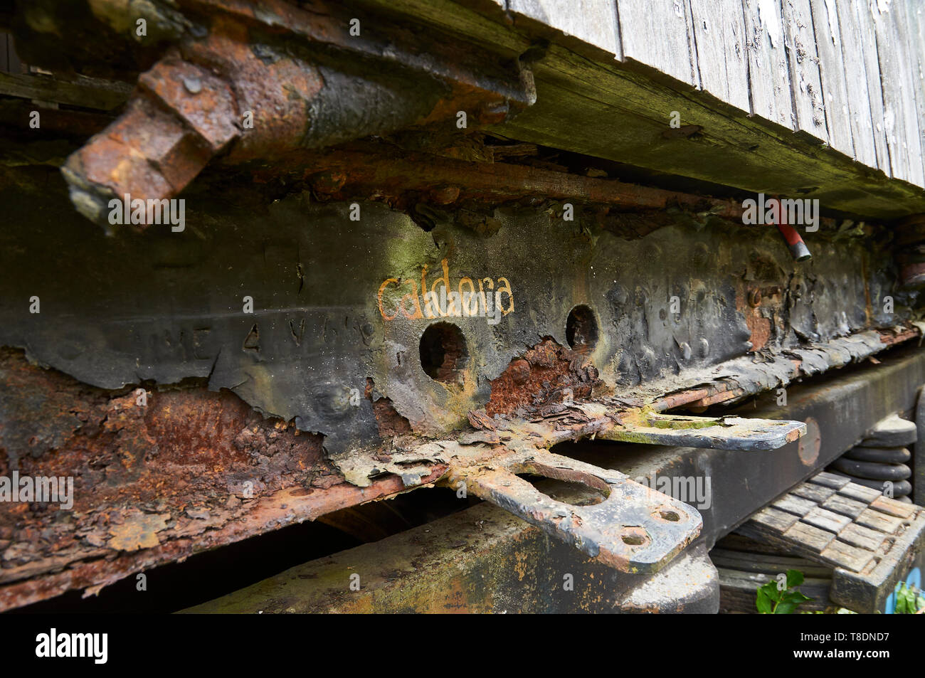 Detail of boiler intake in rusty train car at the abandoned Canfranc International railway station (Canfranc, Pyrenees, Huesca, Aragon, Spain) Stock Photo