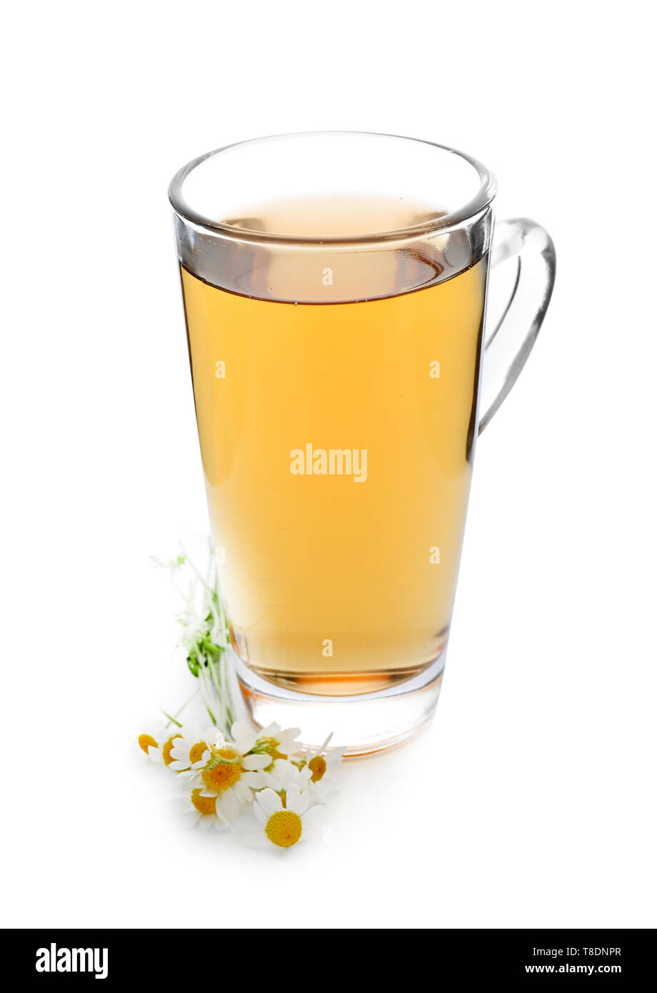 Glass cup of delicious camomile tea on white background Stock Photo - Alamy