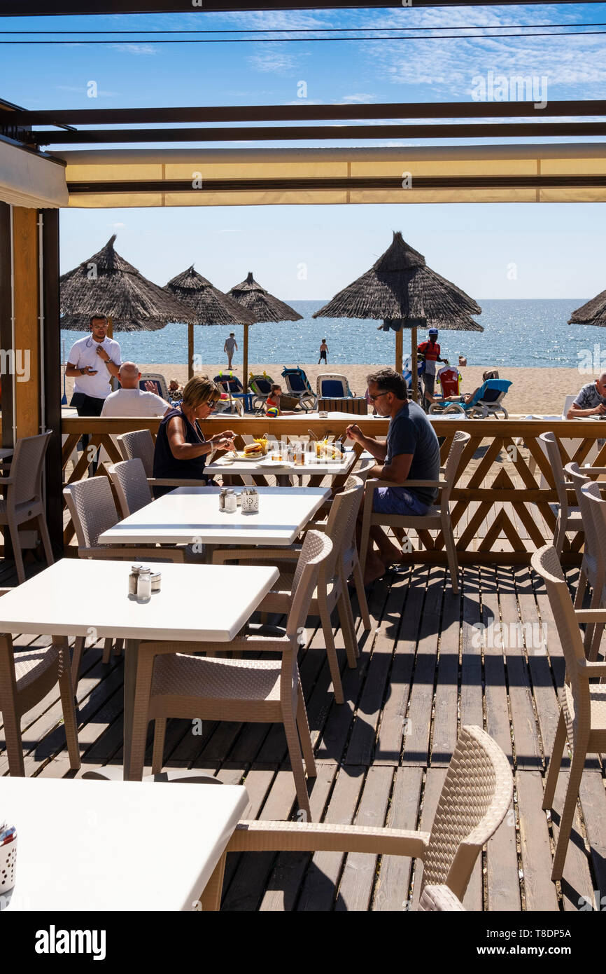 Terrace of a chiringuito bar on the beach of La Cala. Mijas coast. Costa del Sol, Málaga province. Andalusia, Southern Spain. Europe Stock Photo