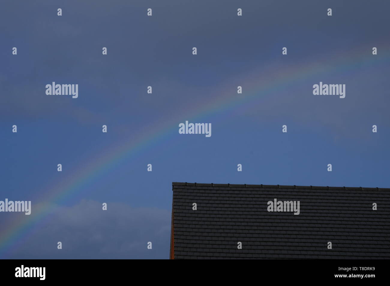 Dark sky rainbow hi-res stock photography and images - Alamy