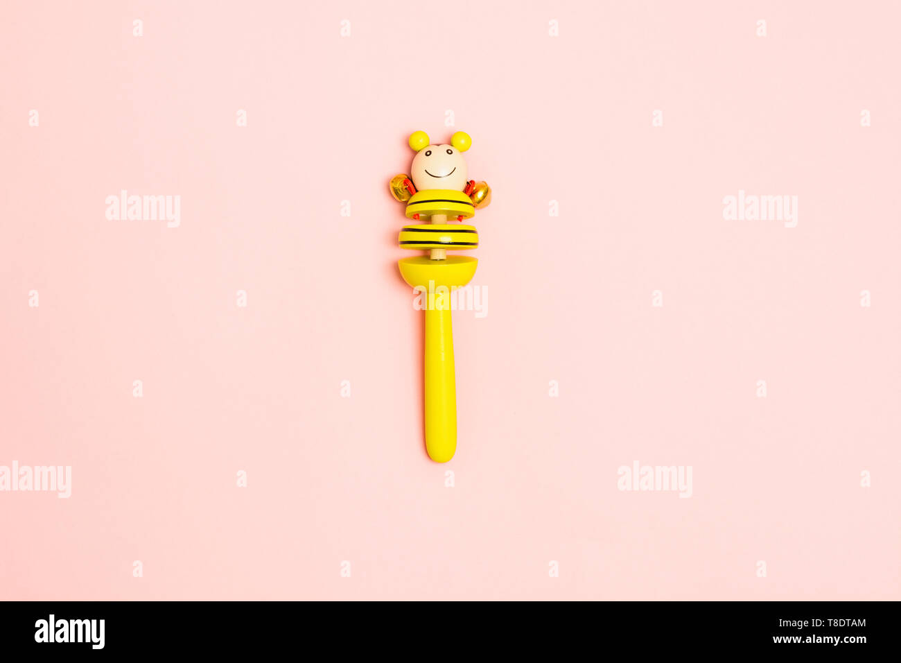 wooden rattle with bells