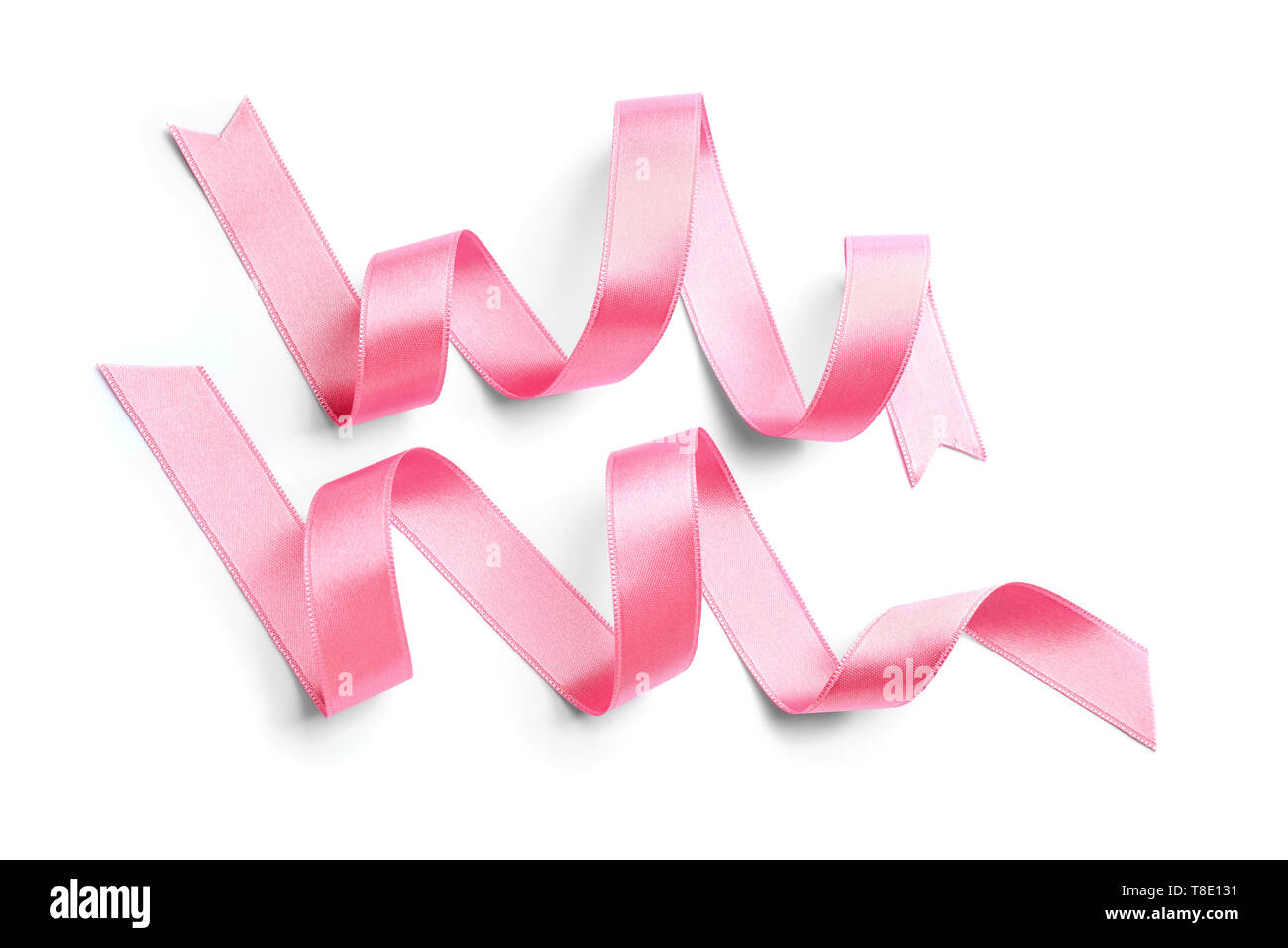 Pink satin ribbons on white background Stock Photo - Alamy