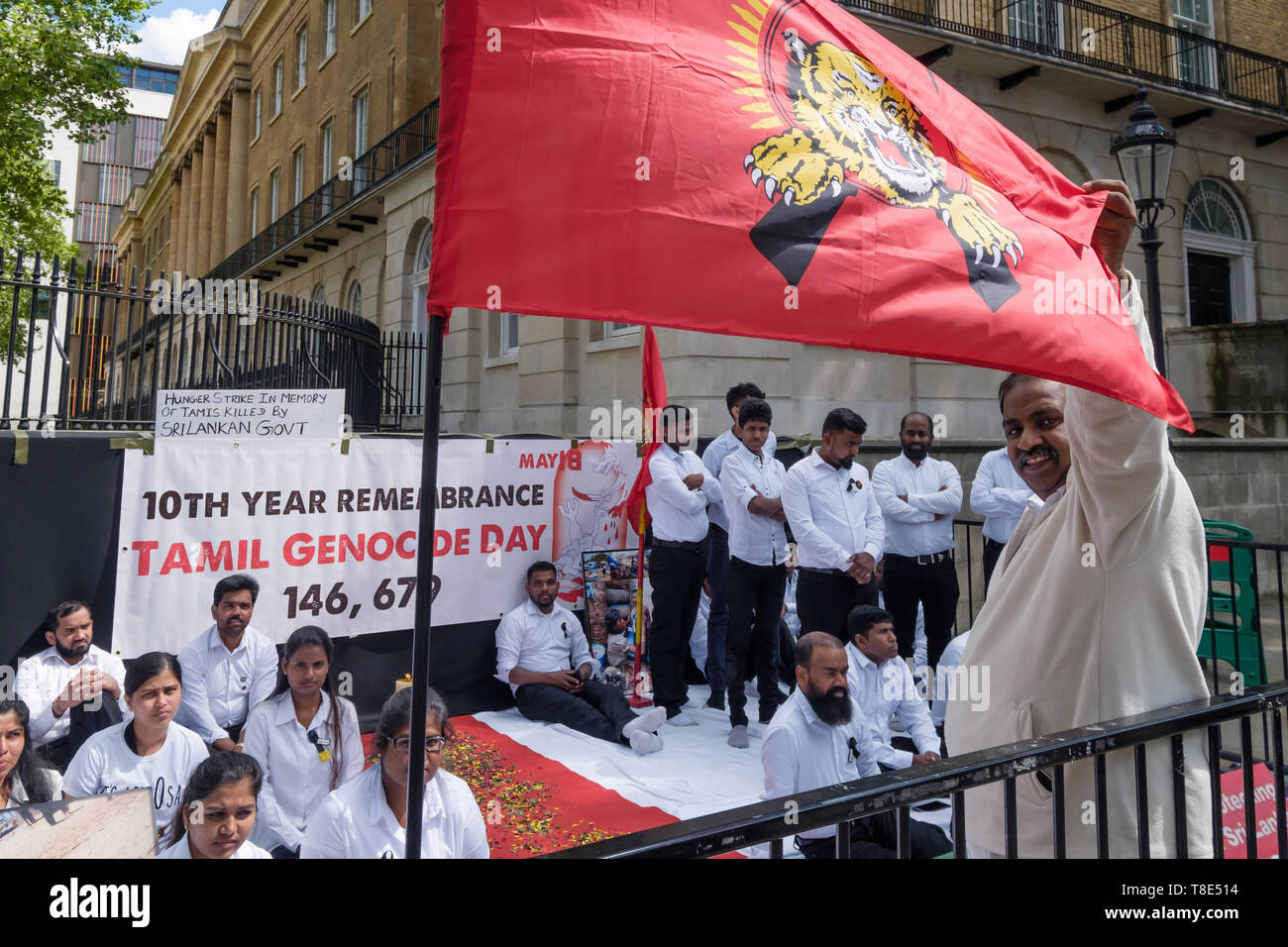 London, UK. 12th May 2019. Tamils begin a hunger strike at Downing St ending on May 18th, Tamil Genocide Remembrance Day, banned in Sri Lanka where it is celebrated as Victory Day by the government. Tamils claim there were 156,689 Tamil civilians unaccounted for at the end of the war, many of them killed by shelling in the last 5 months and no one has been held accountable. They demand recognition of the Tamil Genocide, an International Tribunal to investigate the atrocities and self determination for Tamils in Sri Lanka. Peter Marshall/Alamy Live News Stock Photo