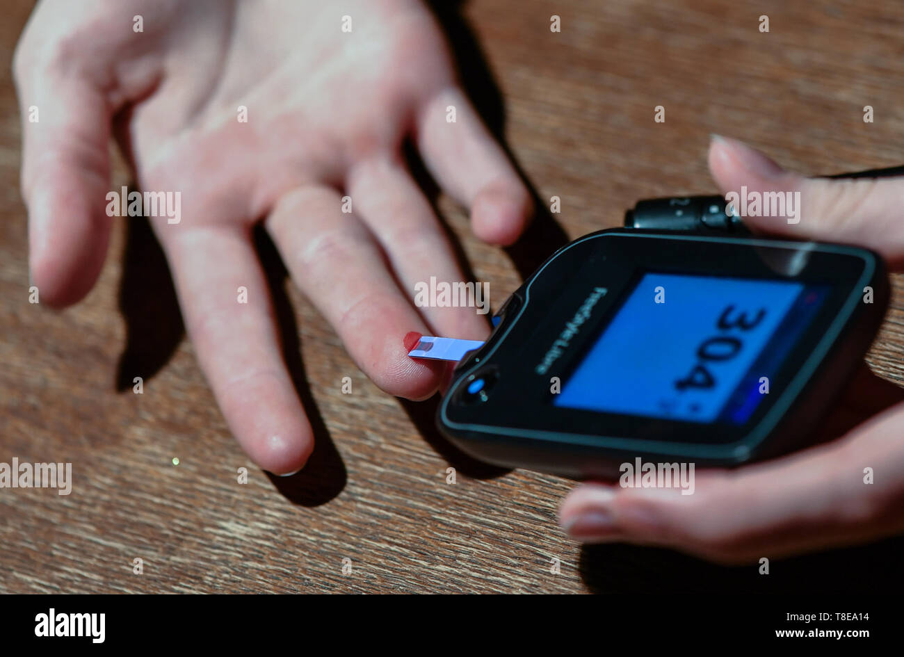 Berlin, Germany. 28th Feb, 2019. A girl suffering from type 1 diabetes