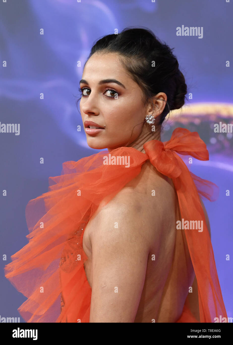 Berlin, Germany. 11th May, 2019. Actress Naomi Scott at the gala screening of the film 'Aladdin' at the cinema UCI Luxe Mercedes Square. The film will be released in German cinemas on 23.05.2019. The new Disney film is a real film adaptation of the 1992 cartoon of the same name and is based on the story Aladdin and the magic lamp from the fairy tales of 1001 Nights. Credit: Jens Kalaene/dpa-Zentralbild/dpa/Alamy Live News Stock Photo