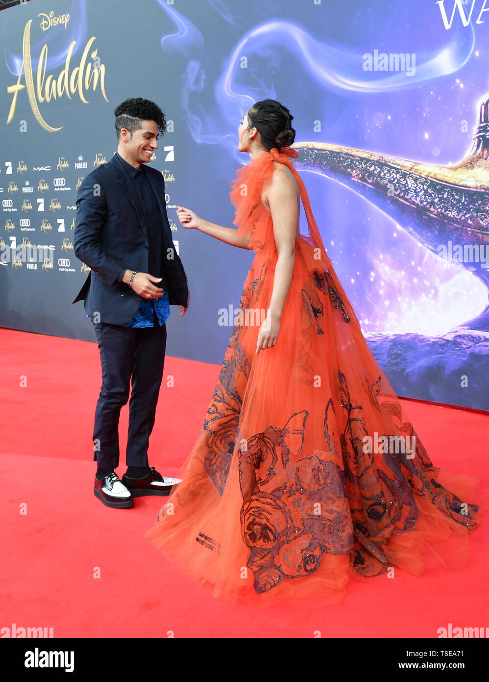 Berlin, Germany. 11th May, 2019. The actors Mena Massoud (l) and Naomi Scott at the gala screening of the film 'Aladdin' at the cinema UCI Luxe Mercedes Square. The film will be released in German cinemas on 23.05.2019. The new Disney film is a real film adaptation of the 1992 cartoon of the same name and is based on the story Aladdin and the magic lamp from the fairy tales of 1001 Nights. Credit: Jens Kalaene/dpa-Zentralbild/dpa/Alamy Live News Stock Photo