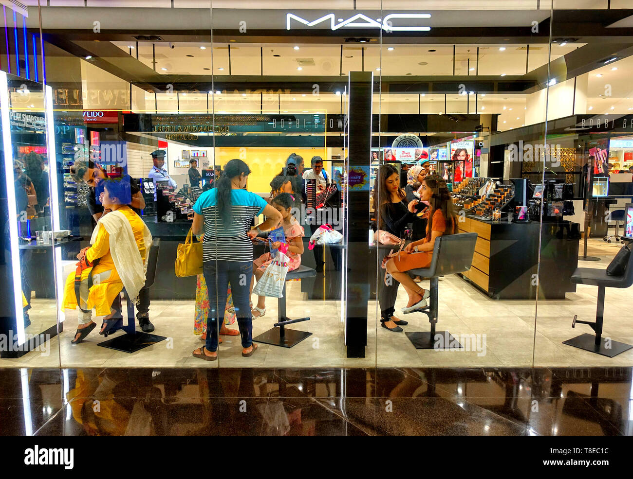 Kolkata, WEST BENGAL, India. 12th May, 2019. Women seen getting dressed up with branded MAC Cosmetics at a Store of South City mall in Kolkata. MAC stylized as MÂ·AÂ·C which is a cosmetics manufacturer founded in Toronto, Canada. Credit: Avishek Das/SOPA Images/ZUMA Wire/Alamy Live News Stock Photo