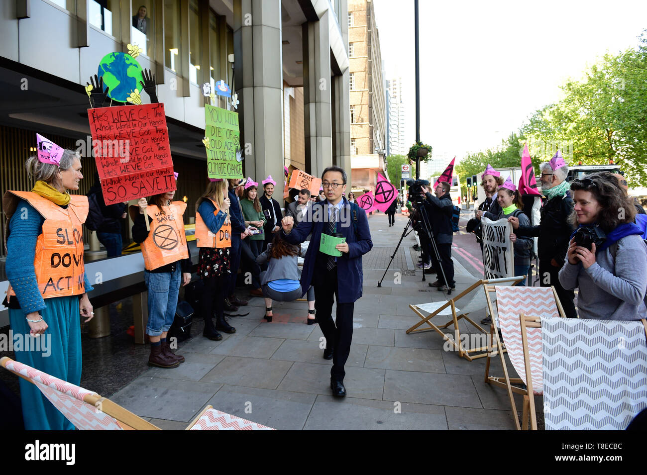 London, UK. 13th  May, 2019. Extinction Rebellion climateExtinction Rebellion Gather outside the International Maritime Organisation demand that the IMO declare a climate emergency. with delegates from 190+ countries meeting in London to discuss and agree on immediate measures to reduce shipping’s climate impacts. Credit: Quan Van Alamy/Live News Stock Photo