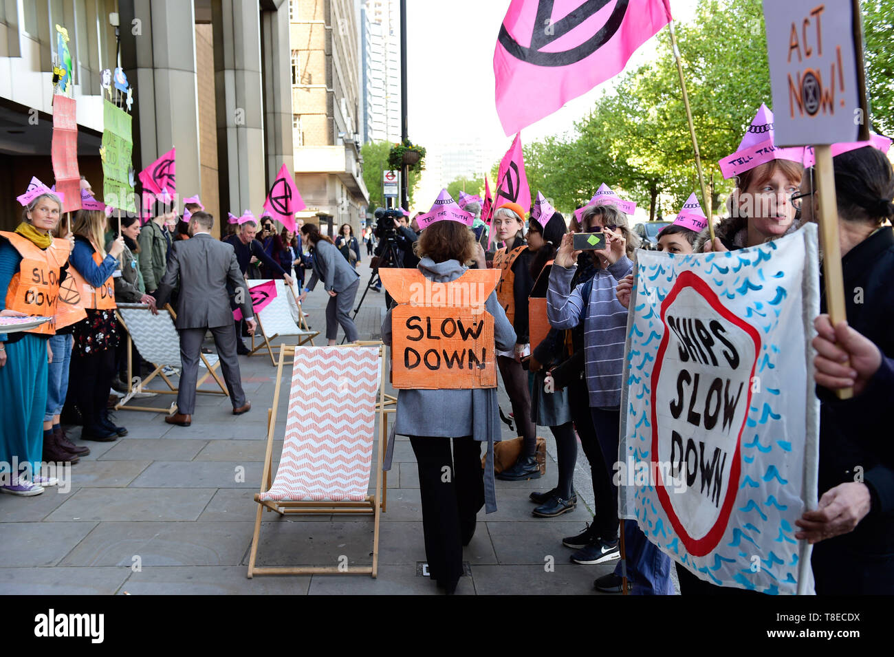 London, UK. 13th  May, 2019. Extinction Rebellion climateExtinction Rebellion Gather outside the International Maritime Organisation demand that the IMO declare a climate emergency. with delegates from 190+ countries meeting in London to discuss and agree on immediate measures to reduce shipping’s climate impacts. Credit: Quan Van Alamy/Live News Stock Photo