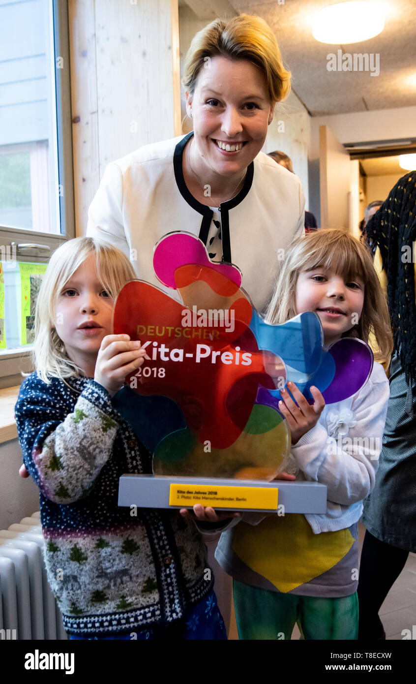 13 May 2019, Berlin: Franziska Giffey (SPD), Federal Minister for Family Affairs, visits the kindergarten 'Menschenskinder' in Berlin-Friedrichshain and lets children show her the rooms. Last year, the kindergarten was awarded the 'Kita of the Year' category by the Federal Ministry for Family Affairs, Senior Citizens, Women and Youth and the German Children and Youth Foundation (DKJS). This year's winners of the competition will be announced in the evening. Photo: Bernd von Jutrczenka/dpa Stock Photo