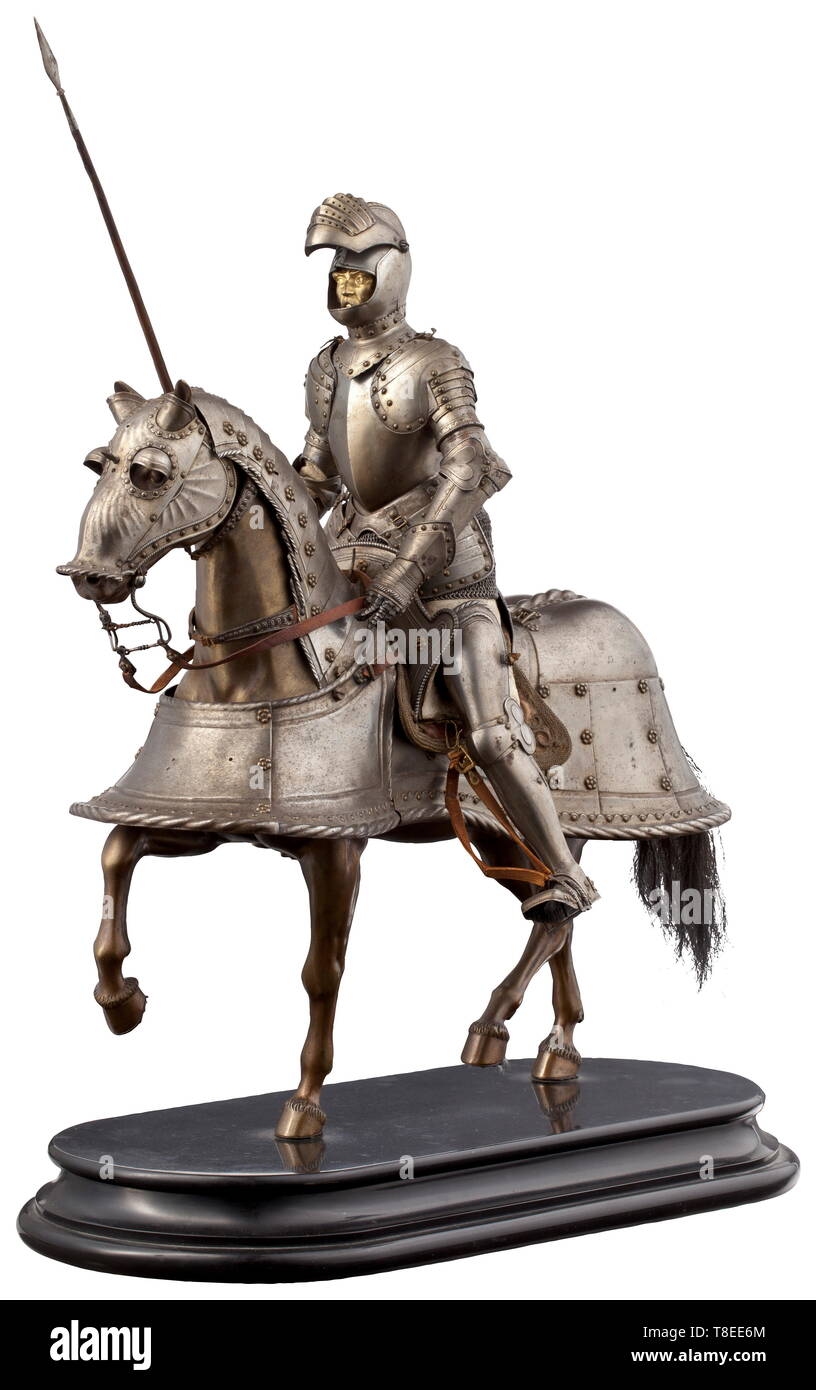 A significant miniature armour, E. Granger in Paris High-quality miniature armour for horseman and horse in the style of circa 1530/40. All parts of the armour made in extraordinarily fine quality, each part corresponds to the original and with sliding lames, fully functional. The horseman with closed helmet with pivoted vis 19th century, Additional-Rights-Clearance-Info-Not-Available Stock Photo