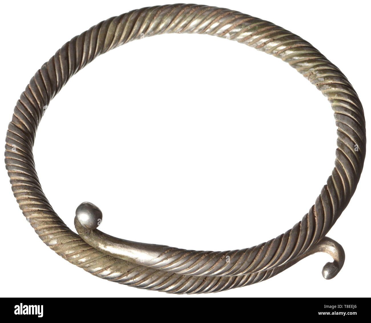 A Greek silver armlet, 4th century BC Slightly tapered, helically tightly knurled armlet with head-shaped hook closures. Diameter 10.5 cm, weight 178.5 g. Provenance: Hemmerich Collection, Vienna, 1950s until 1989. historic, historical, ancient world, ancient times, Greek, Hellas, ancient world, Additional-Rights-Clearance-Info-Not-Available Stock Photo