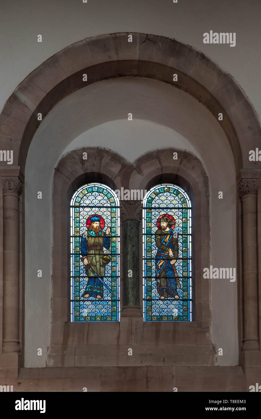Pre-Raphaelite stained glass depicting Levi and Judah, son's of Jacob and Leah St Catherine church Hoarwithy Herefordshire England UK. February 2019. Stock Photo