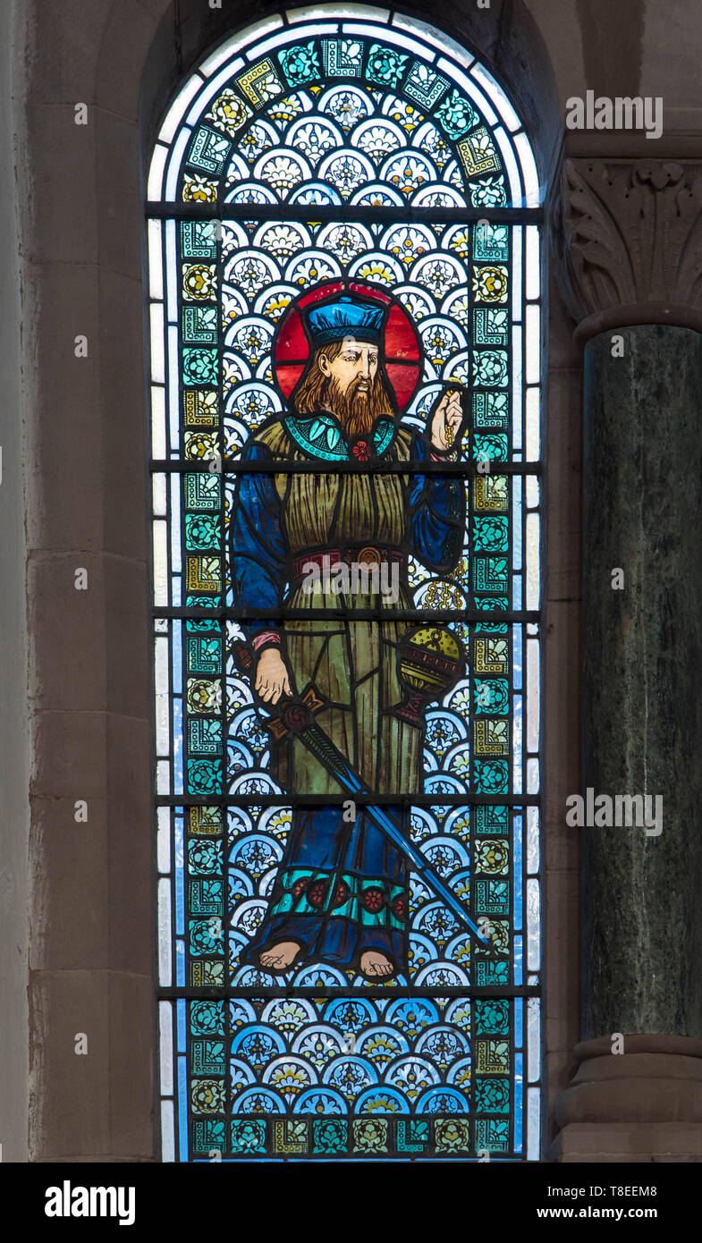 Pre-Raphaelite stained glass depicting Levi son of Jacob and Leah, St Catherine church Hoarwithy Herefordshire England UK. February 2019. Stock Photo