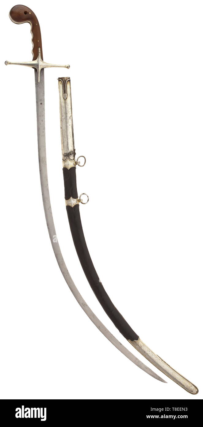 An Ottoman silver-mounted shamshir, circa 1840 Unusually narrow, curved single-edged blade with smith's mark on the obverse side. Geometrically engraved, silver quillons and grip strap, riveted rhinoceros horn grip panels with finger rests. Wooden scabbard stitched with silver wire and covered with shagreen leather, the suspension bars and the silver fittings engraved en suite. All silver parts with stamped thugra of Abdul Mecid (1839 - 1861), the quillons with French importation stamp (swan within oval). The flap of the back is missing, one-side, Additional-Rights-Clearance-Info-Not-Available Stock Photo