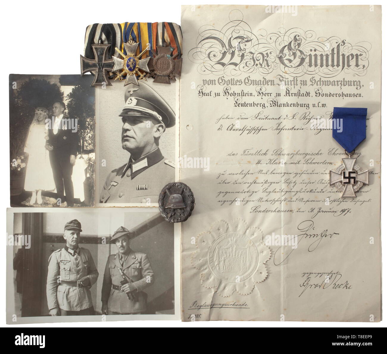 Decorations and documents grouping of Reserve Major Richard Wernecke (1895 - 1958) Three-piece orders clasp with Prussia: Iron Cross 2nd Class of 1914, Schwarzburg-Sondershausen: Honour Cross 3rd Class with Swords, German Empire: Cross of Honour for Front Fighters 1934. Also, a Wound Badge in Black 1918 and a Faithful Service Decoration 2nd Class 1938. Included are a case of the Sondershausen court jeweller 'Karl Schühle' for the Honour Cross and the award document of 1917 with transmittal letter and statute copy, the award documents for the Iron, Additional-Rights-Clearance-Info-Not-Available Stock Photo