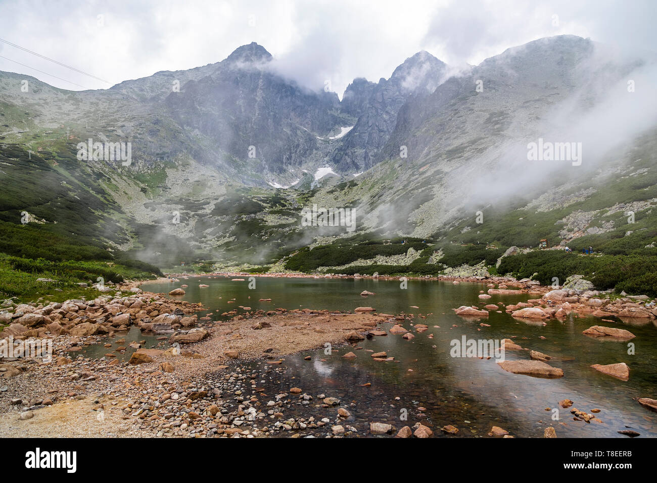 Mount Lomnicky Peak in the High Tatras and lake in the mountains. Slovakia Stock Photo