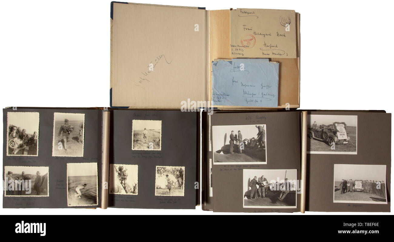Three photo albums of Knight's Cross winner Fritz Neumüller - StukaG. 77 Three inscribed albums with a total of circa 490 images of the pilot and adjutant of Gruppe II/Stukageschwader 77. Portrait wearing the Knight's Cross, pilot training, flights with training machines, aerial images of adjacent aircraft and the cockpit. Photos of a combat mission to Lüttich, the Meuse by Charleville, operations in Russia with '6./St.G. 77', the Siege of Sevastopol, images of Kharkov and Taganrog. Images of Knight's Cross winners, award of the Honour Goblet, celebrations for 300, 400, 500, Editorial-Use-Only Stock Photo
