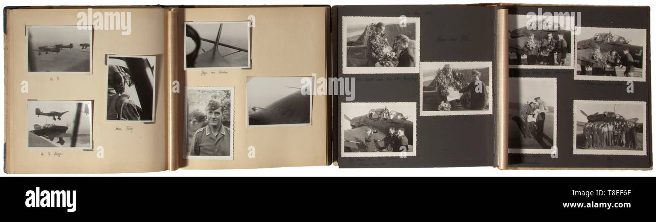 Three photo albums of Knight's Cross winner Fritz Neumüller - StukaG. 77 Three inscribed albums with a total of circa 490 images of the pilot and adjutant of Gruppe II/Stukageschwader 77. Portrait wearing the Knight's Cross, pilot training, flights with training machines, aerial images of adjacent aircraft and the cockpit. Photos of a combat mission to Lüttich, the Meuse by Charleville, operations in Russia with '6./St.G. 77', the Siege of Sevastopol, images of Kharkov and Taganrog. Images of Knight's Cross winners, award of the Honour Goblet, celebrations for 300, 400, 500, Editorial-Use-Only Stock Photo