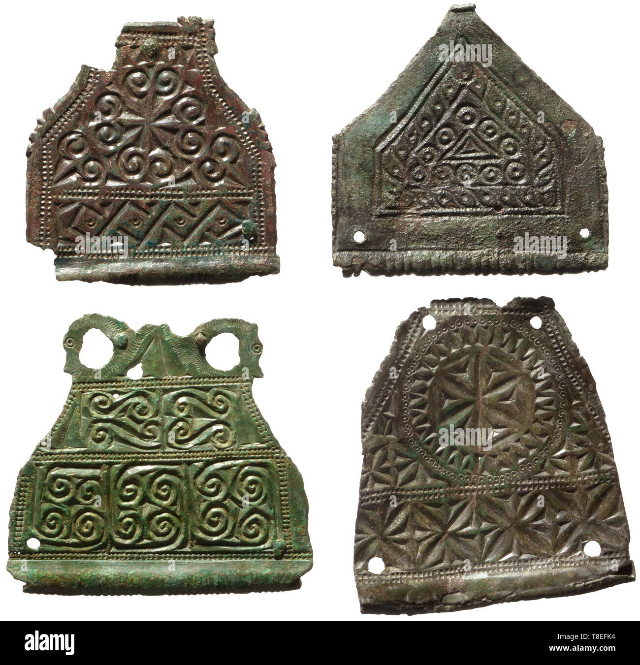 Four Roman fittings for a military belt 4th/5th century AD. Bronze with patina in different shades of green. Delicate fittings with graphical and geometrical decorations. Width 6 to 7 cm. Provenance: South German private collection, 1970s and later. historic, historical, Roman Empire, ancient world, ancient times, ancient world, Additional-Rights-Clearance-Info-Not-Available Stock Photo
