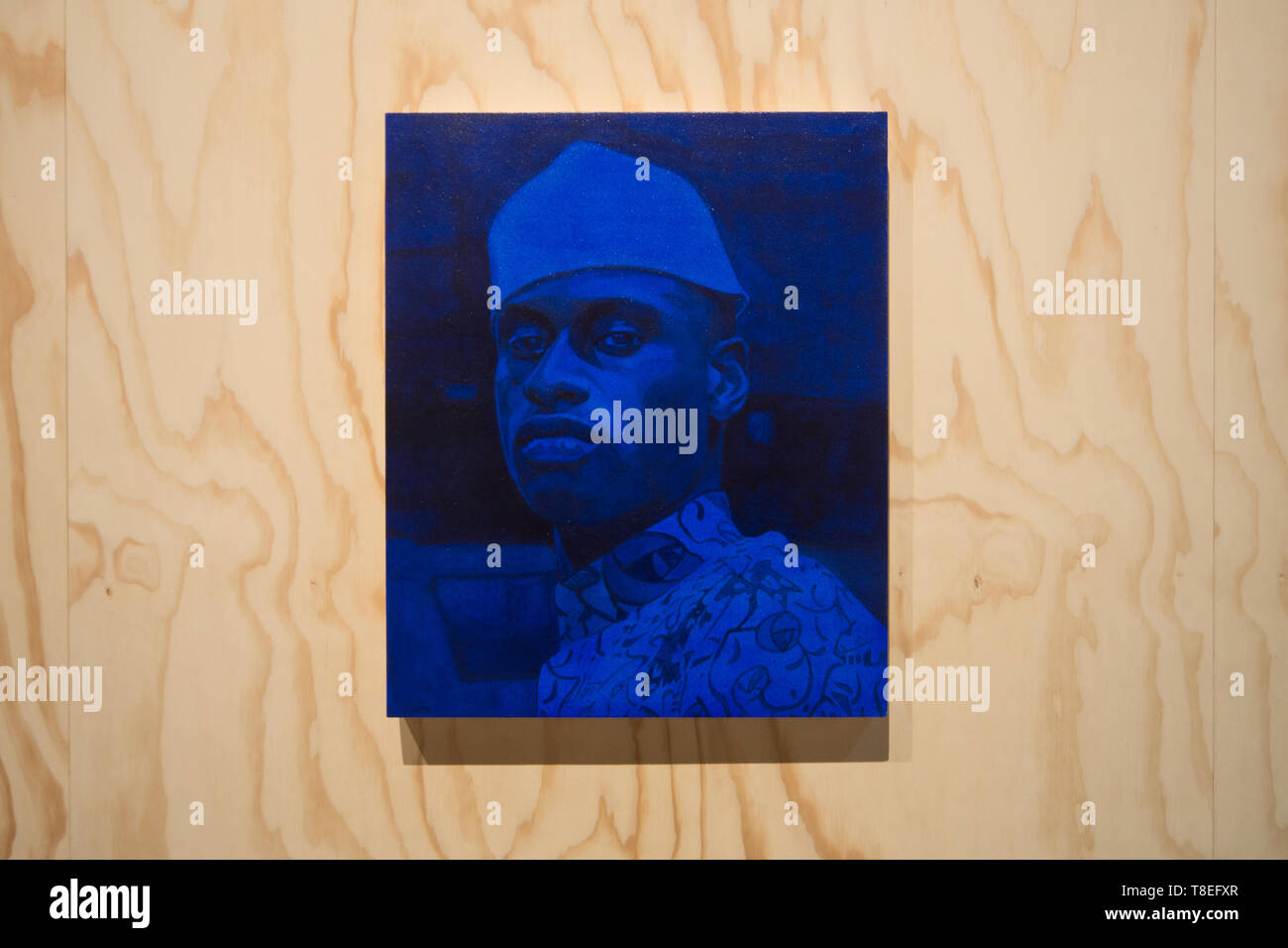 Njideka Akunyili Crosby, I Dey Feel Like, 2019, blue portrait painting, Arsenale exhibition, 58th Venice Art Biennale 2019 Stock Photo