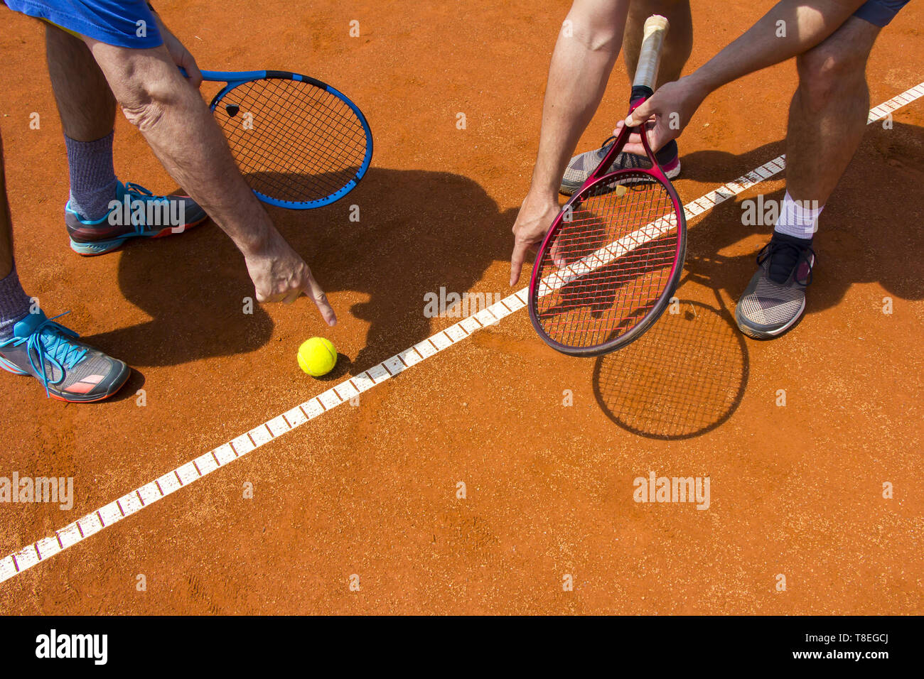 Tennis players shows the track on the tennis court Stock Photo