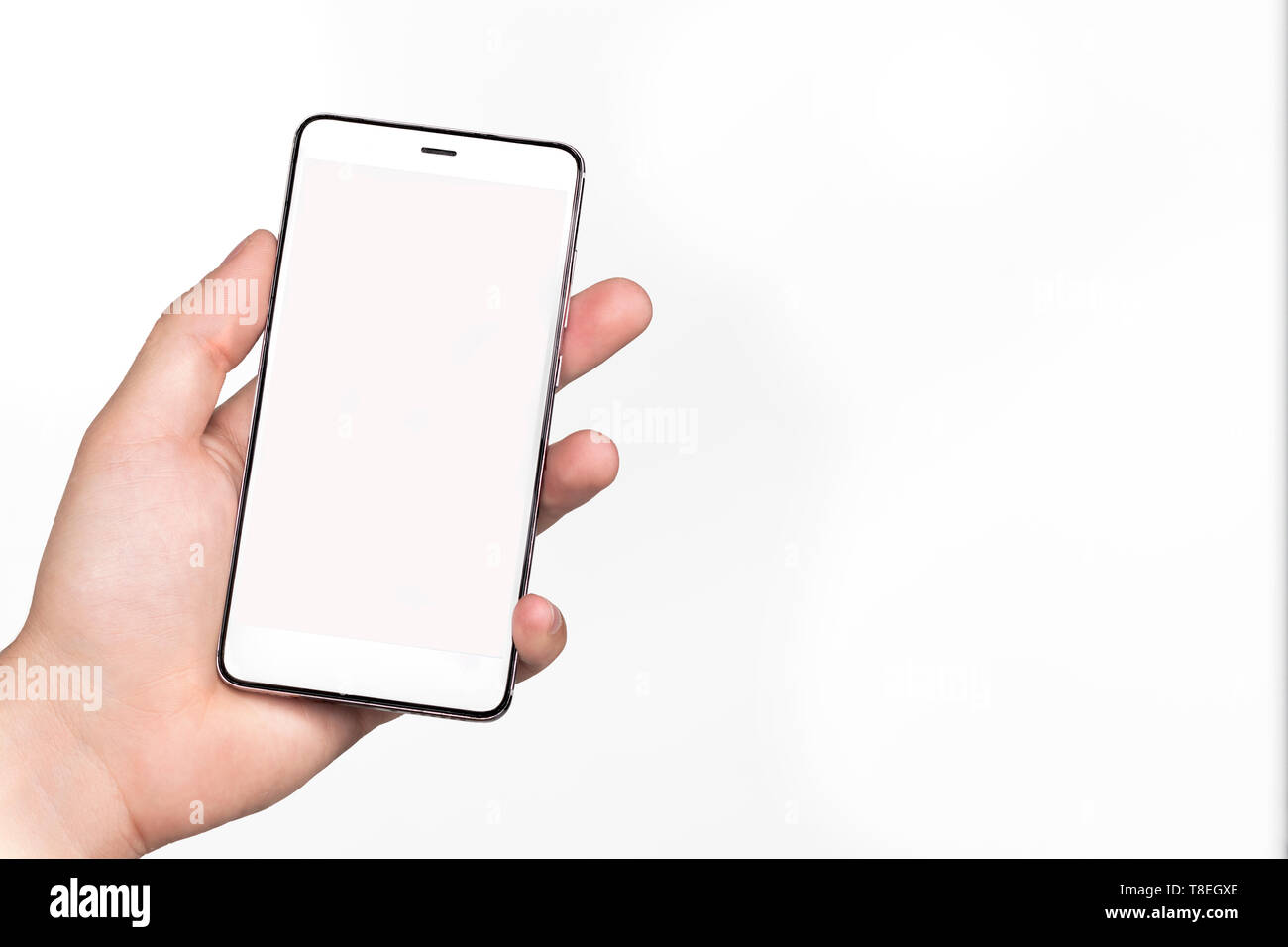 mobile screen mockup, black and white. mobile held by a hand. white background .. ideal for illustrators or write your own messages Stock Photo
