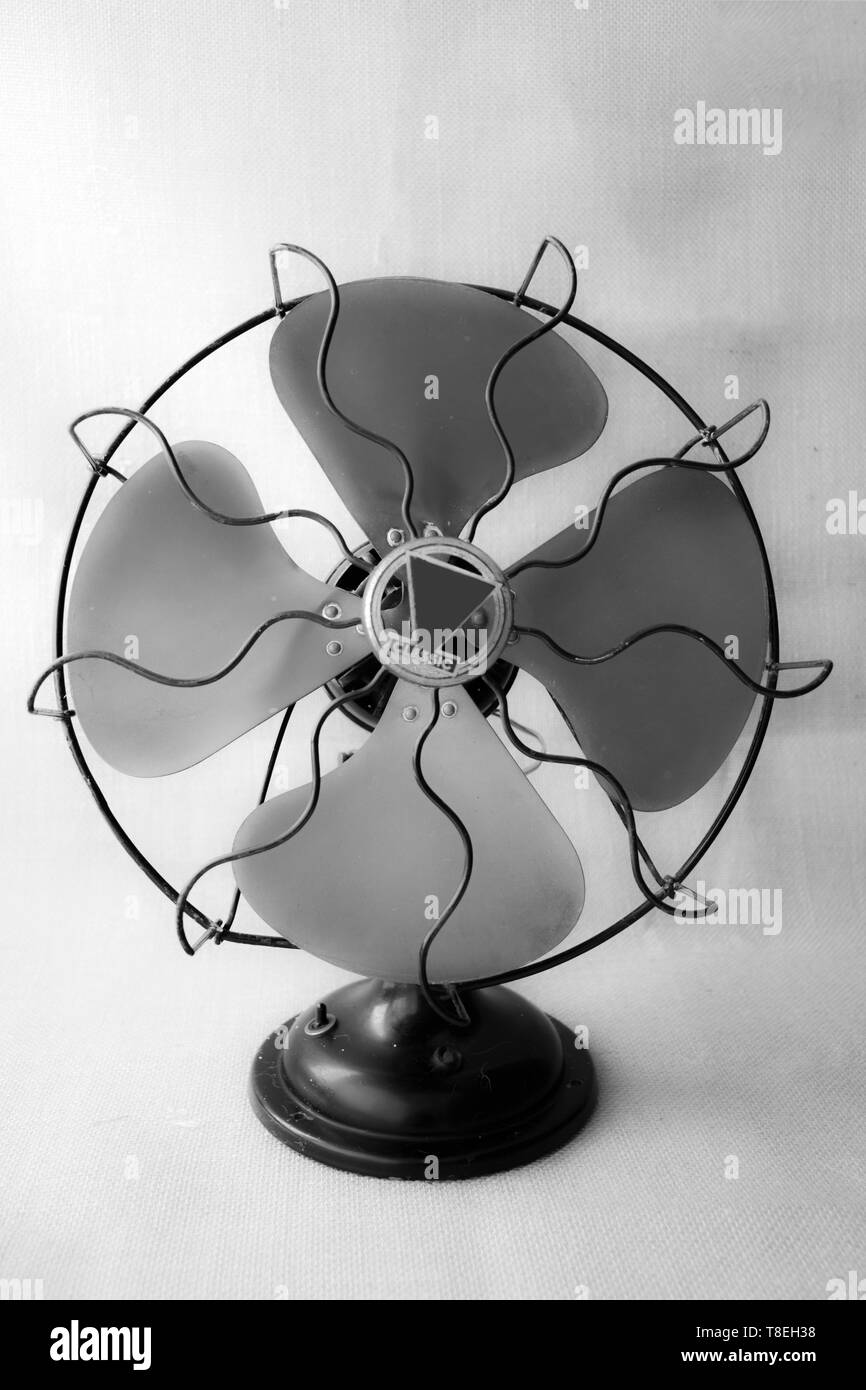 Vintage iron fan background. 50s. Arrival of summer and relief from the heat. cool the air. air conditioning. photographic composition. Stock Photo