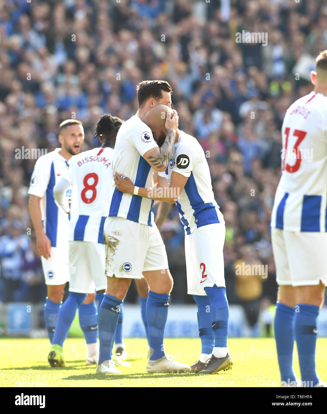 An emotional Bruno Saltor (right)  hands over the captains armband to Lewis Dunk as he is substituted during the Premier League match between Brighton & Hove Albion and Manchester City  at the American Express Community Stadium 12 May 2019 Editorial use only. No merchandising. For Football images FA and Premier League restrictions apply inc. no internet/mobile usage without FAPL license - for details contact Football Dataco Stock Photo